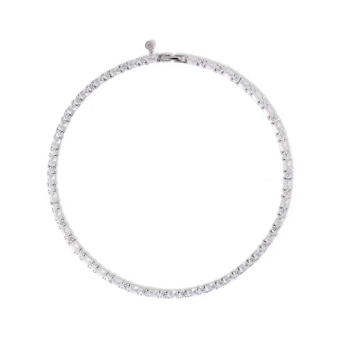Silver necklace with clear stones on a white background