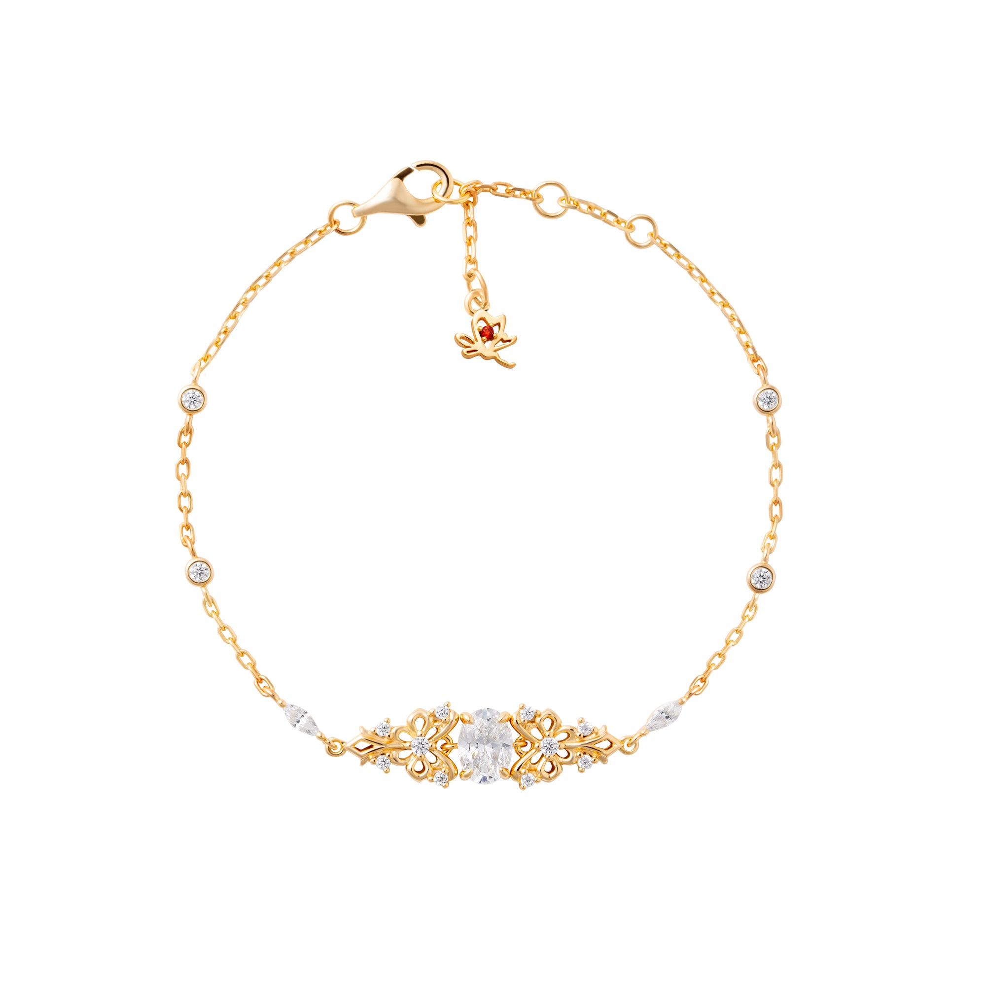 Gold bracelet with decorative clasp on a white background