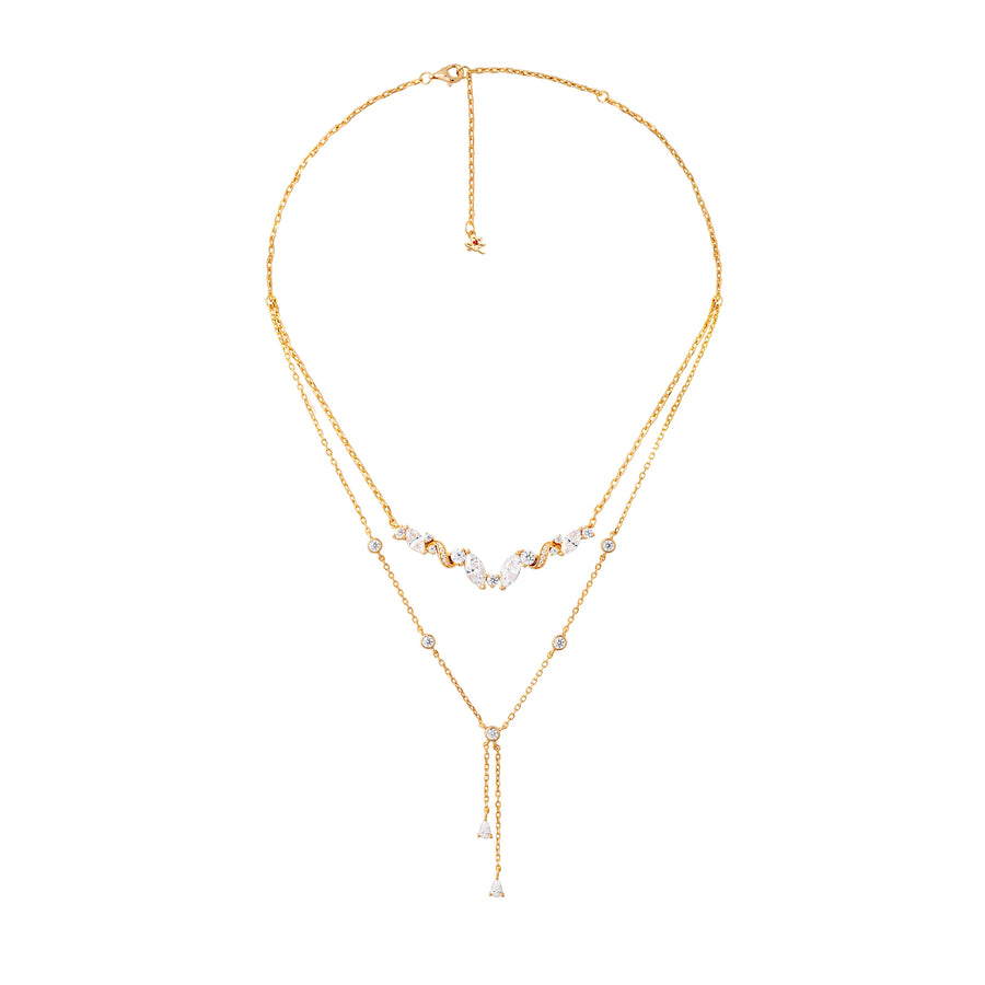 Gold necklace with small beads on a white background