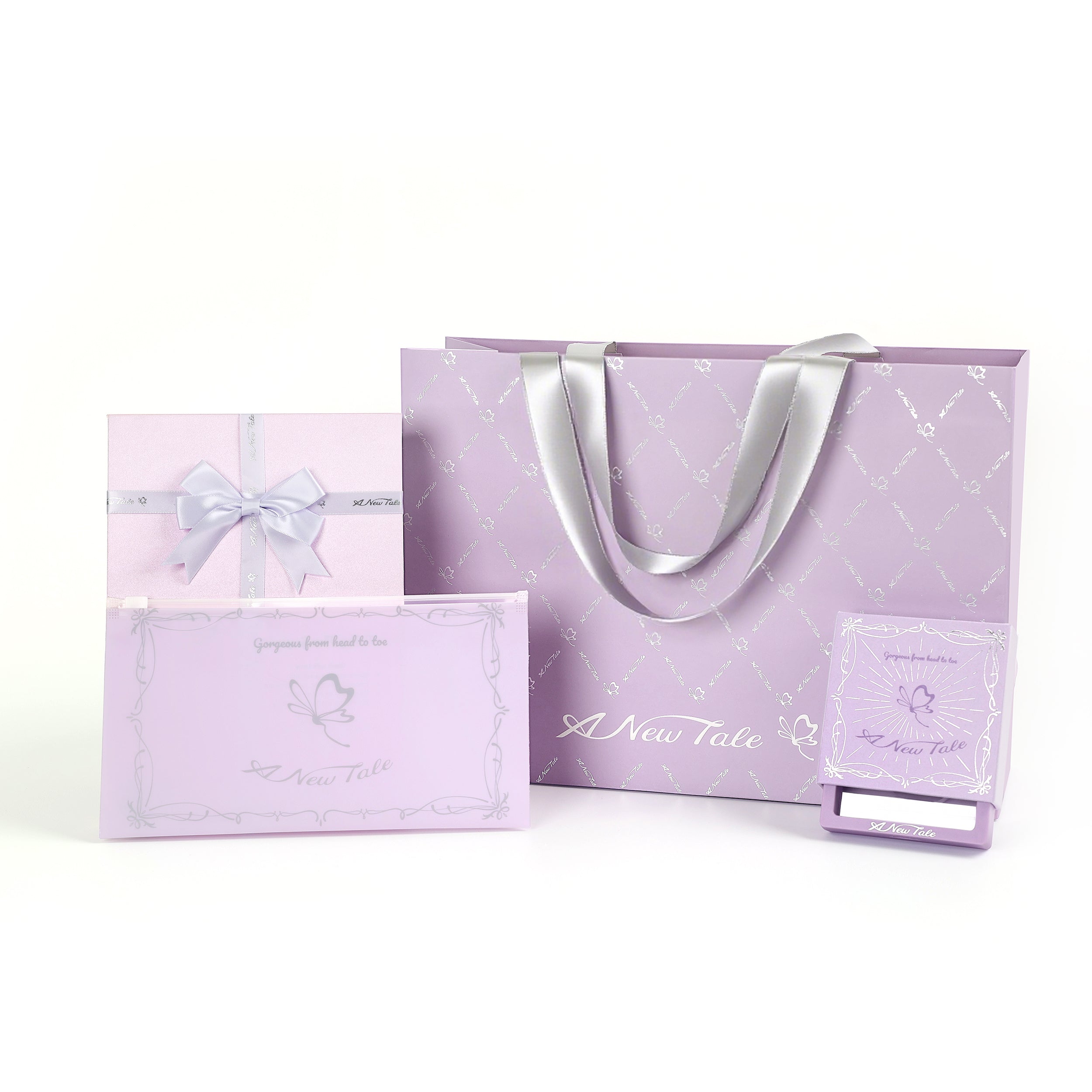 Set of purple gift bags with decorative elements on a white background