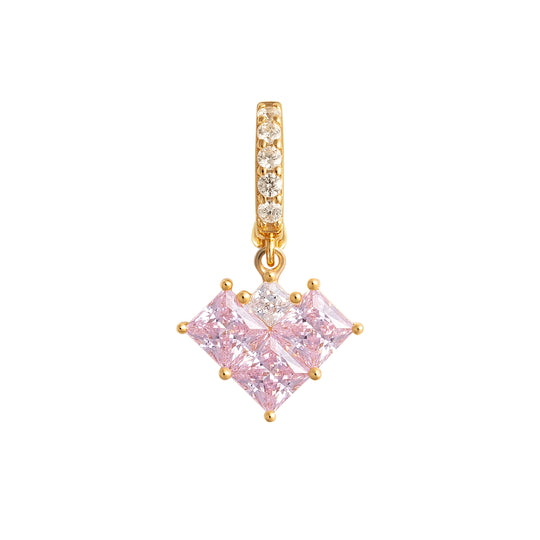 Gold pendant with pink gemstone on a white background