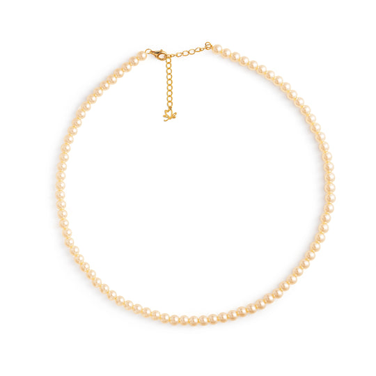 Gold necklace on a white background